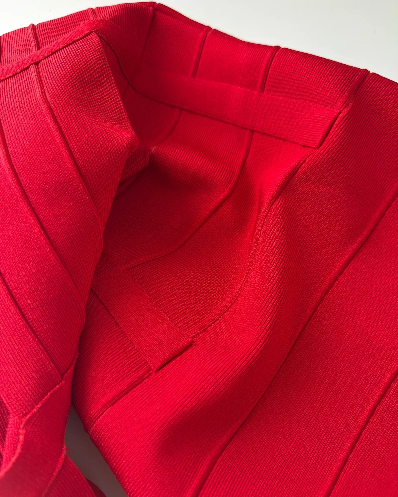 Orvaniwear BCBG Max Azria red bandage bodycon dress featuring signature thick stretch fabric panels