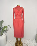 Orvaniwear coral mesh midi dress with halter mock-neck, wrap-front bodice, long sleeves, and ruched tie waist.