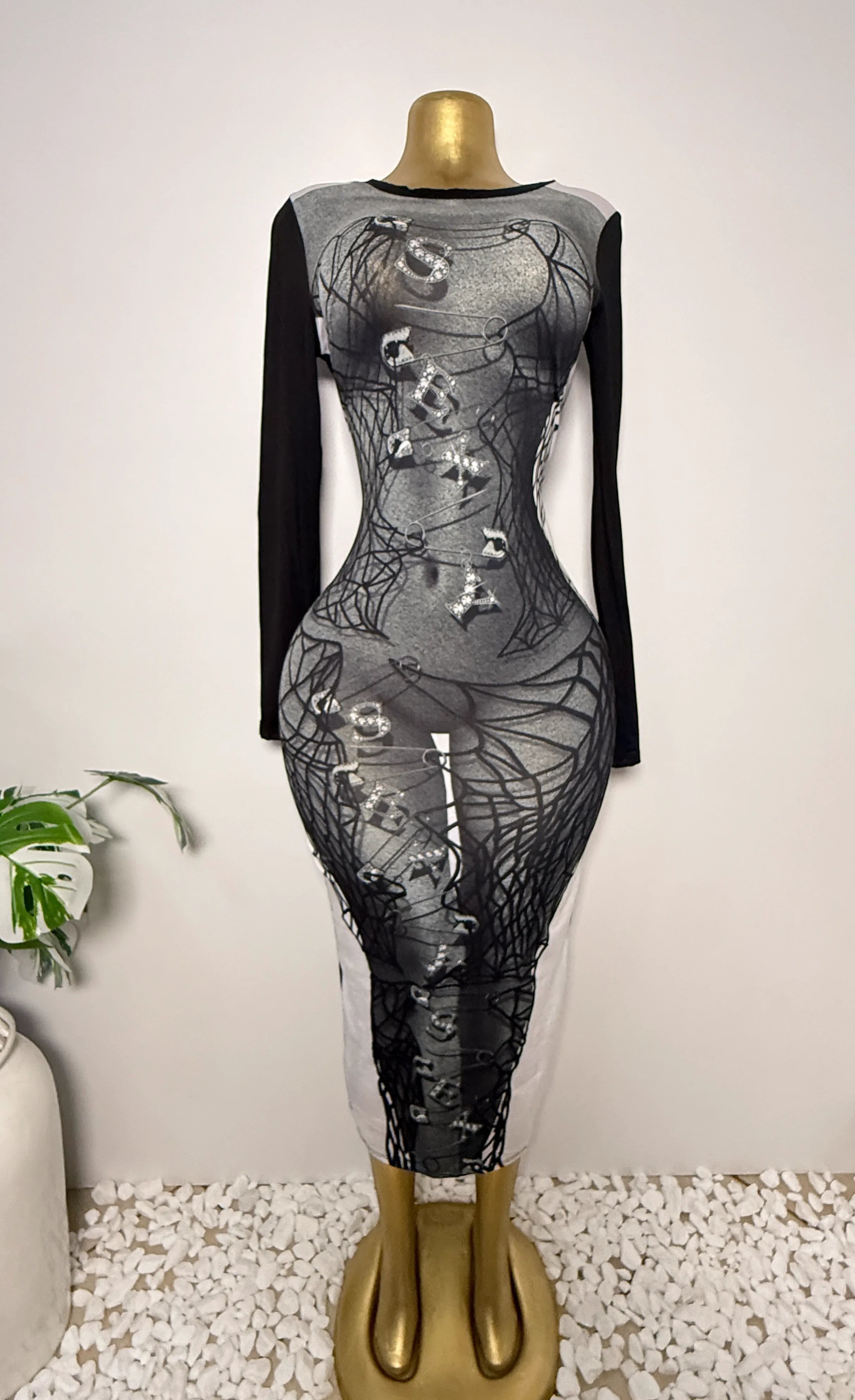 Orvaniwear Fashion Nova grey maxi dress with spiderweb, safety-pin, and rhinestone graphic print and black sleeves.