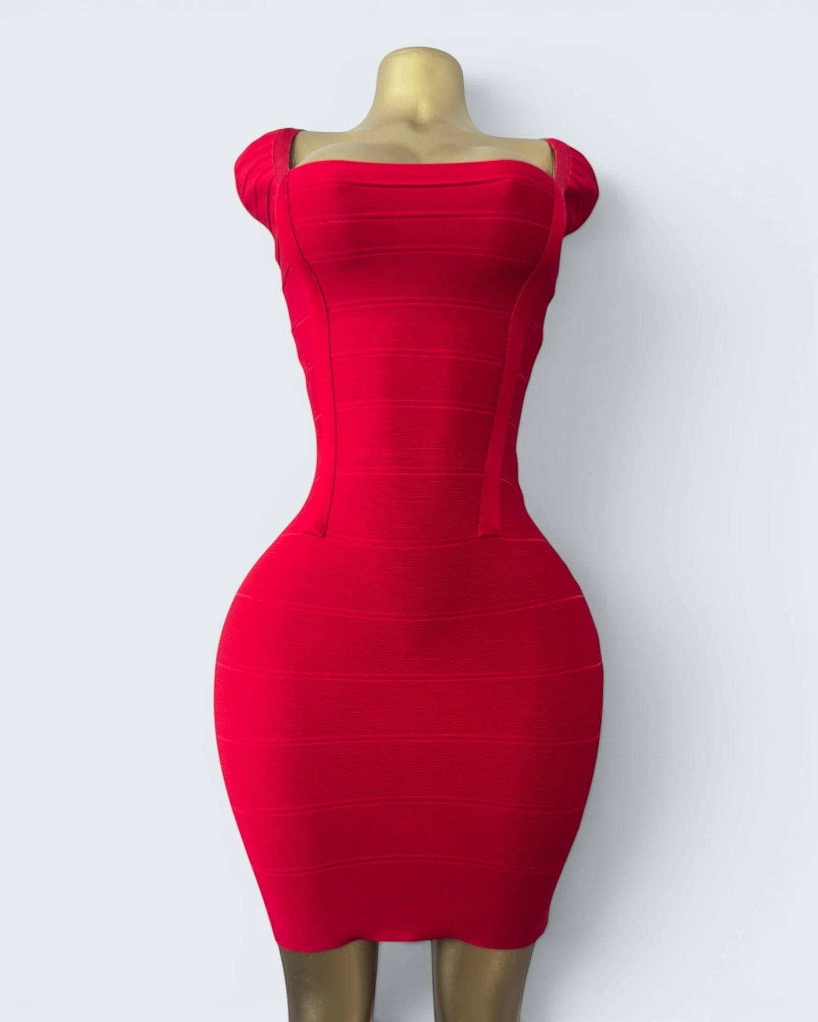 Orvaniwear BCBG Max Azria red bandage bodycon dress with a square neckline and sculpting stretch fit on a mannequin.