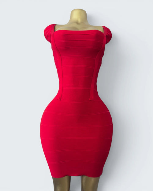 Orvaniwear BCBG Max Azria red bandage bodycon dress with a square neckline and sculpting stretch fit on a mannequin.