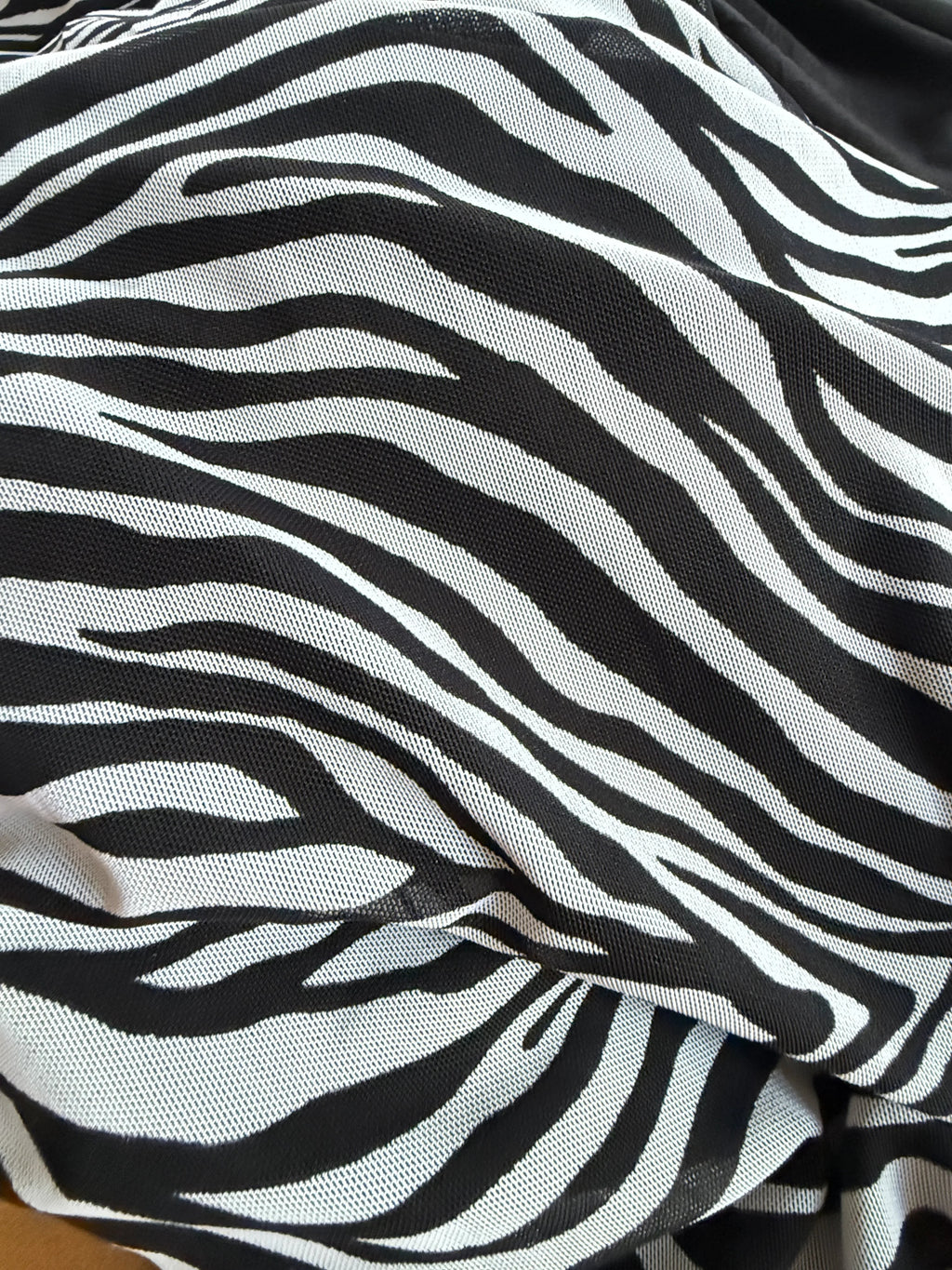Orvaniwear black and white zebra print mesh fabric detail from a Princess Polly bodycon maxi dress