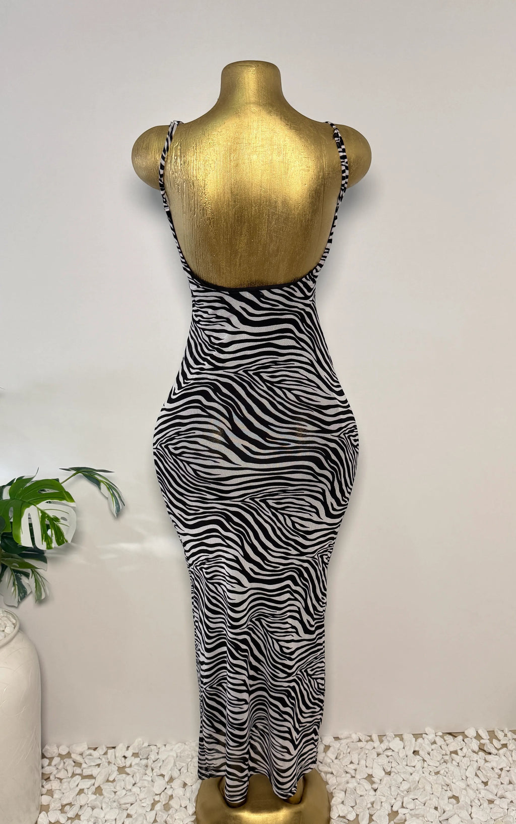 Orvaniwear Princess Polly black and white zebra print mesh bodycon maxi dress with thin straps on a gold mannequin